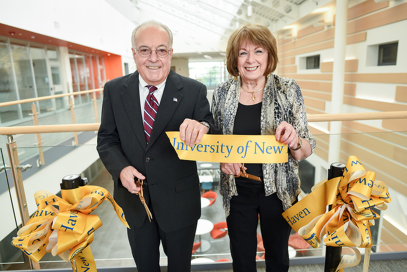 Image of Michael Capasso '20 (left) with Sam Bergami '85 EMBA, '02 Hon. and Lois Bergami.