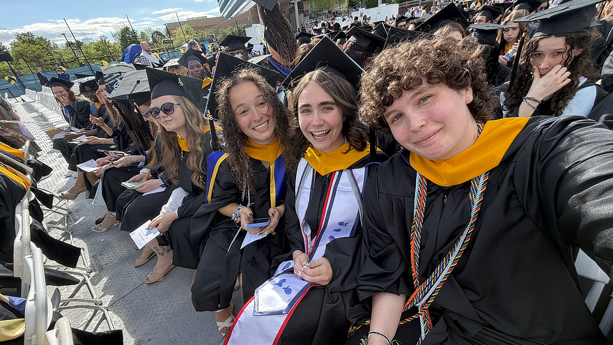 Giavanna A. Cucarese ’25, ’26 M.S. with students at graduation