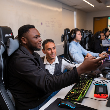 Mehdi Mekni, Ph.D. with students in a computer lab