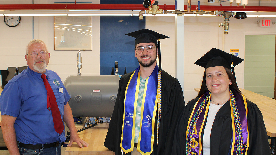 John Kelley, Ryan Barry '26, and Alexis Fernandez ’26