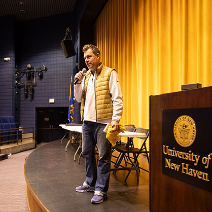President Jens Frederiksen speaking at the University of New Haven's inaugural HackNewHaven event